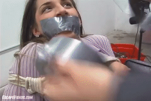 www.escapevideos.com - Nastasia Exposed Duct Tape Gag 1 thumbnail